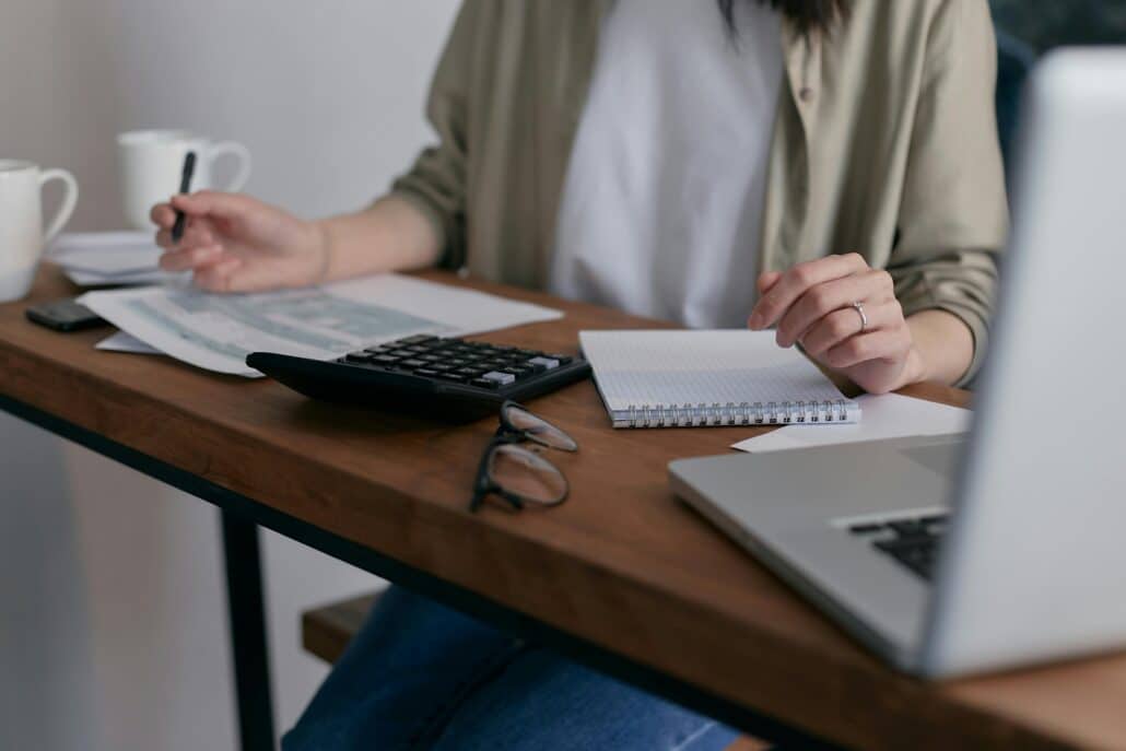 pexels-mikhail-nilov-6963857 4 | Specialized Indianapolis someone doing their taxes at a desk